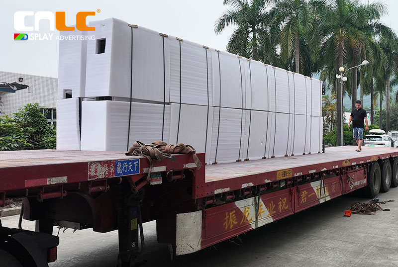 CNLC Factory Workers Preparing LED Billboards for Export