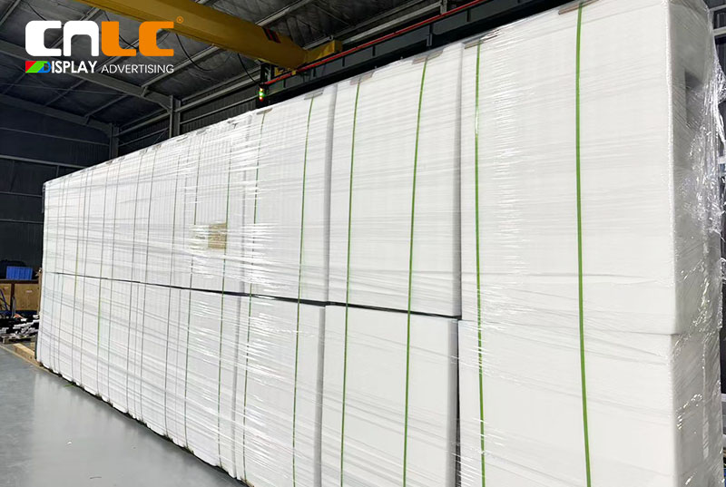 CNLC Factory Workers Preparing LED Billboards for Export